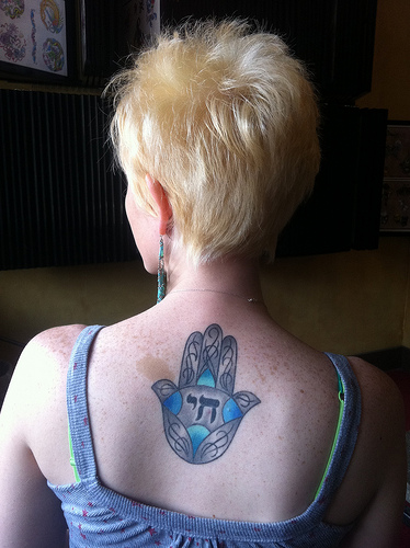 Hamsa tattoo on my back